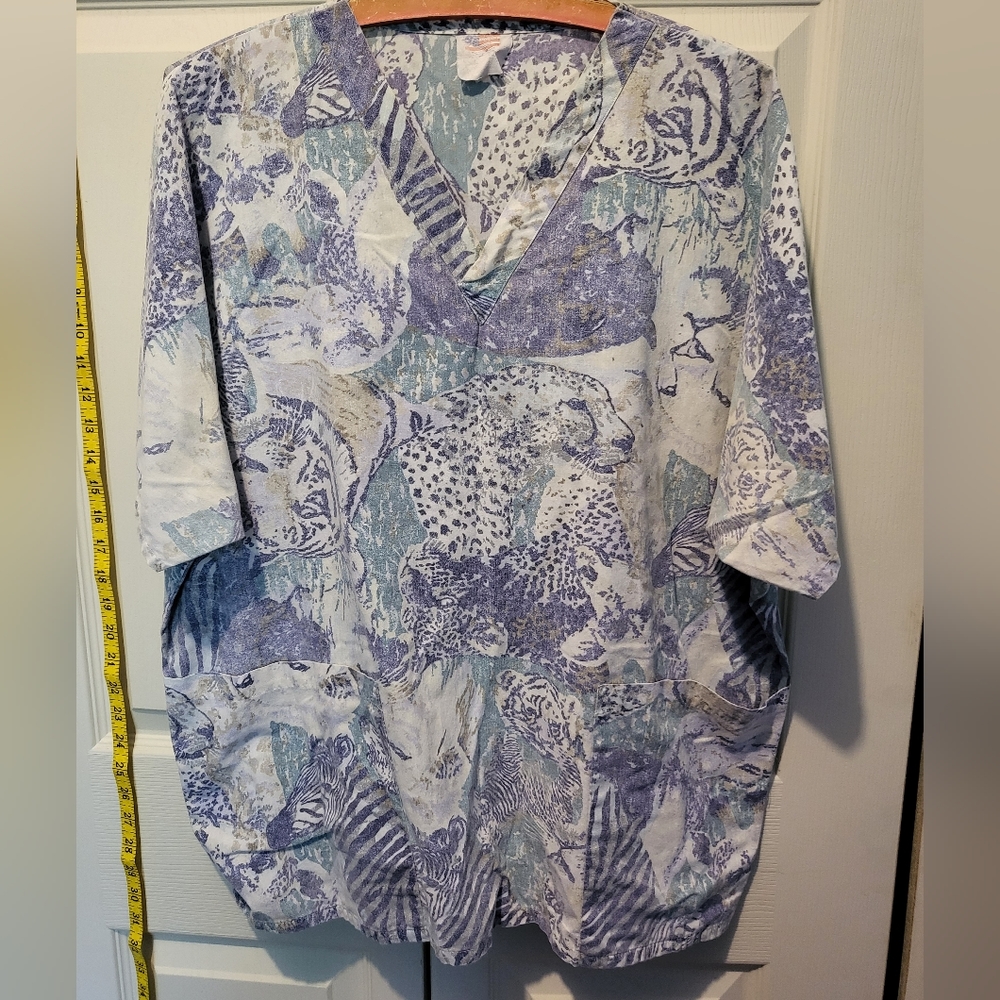 Super soft and loved animal print, 2 pocket, v neck scrub top, light weight